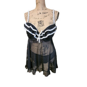 JEZEBEL Lingerie Black 2 piece top and bottoms set, with white lace trim.